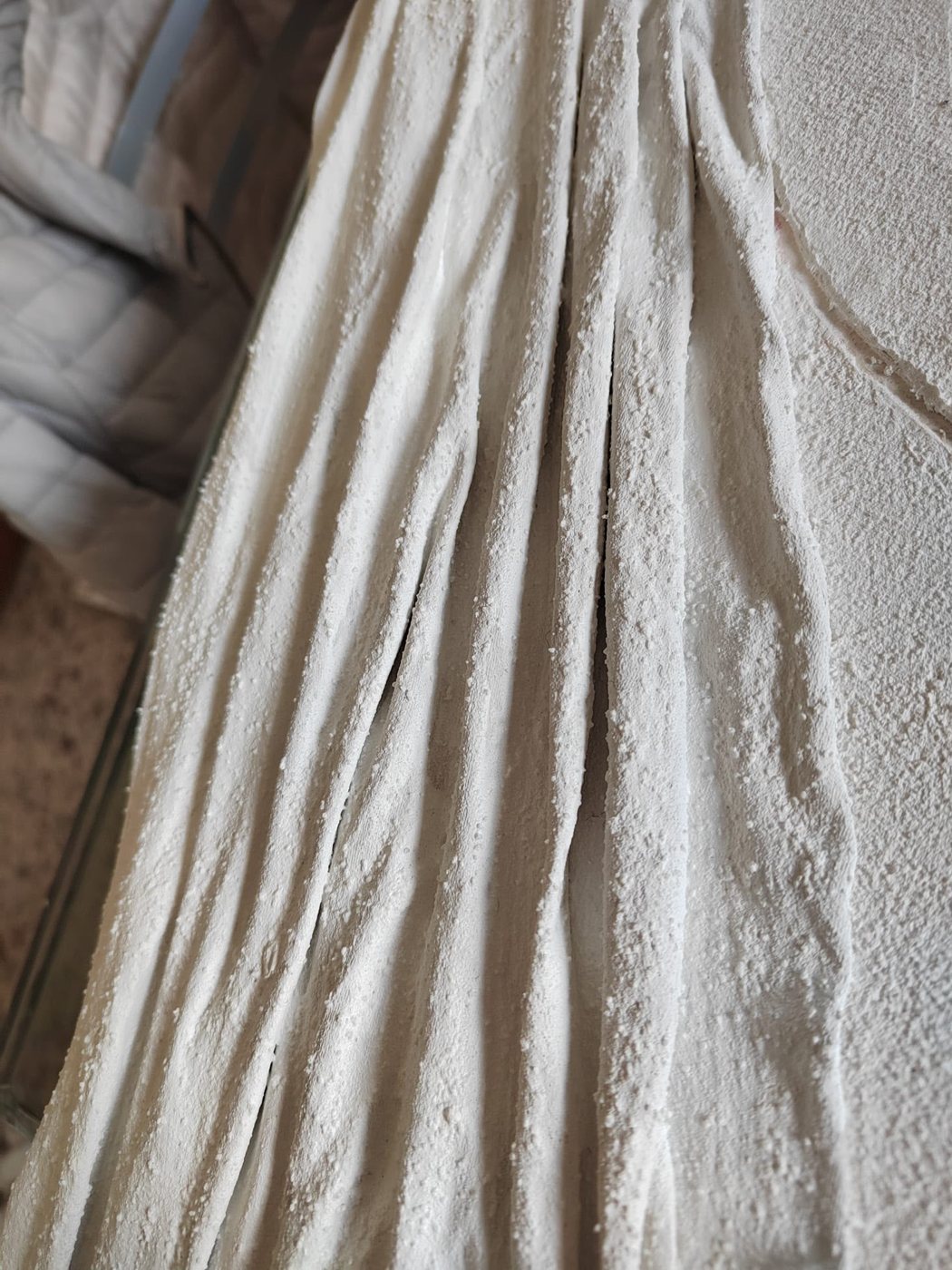 Plaster folds in relief